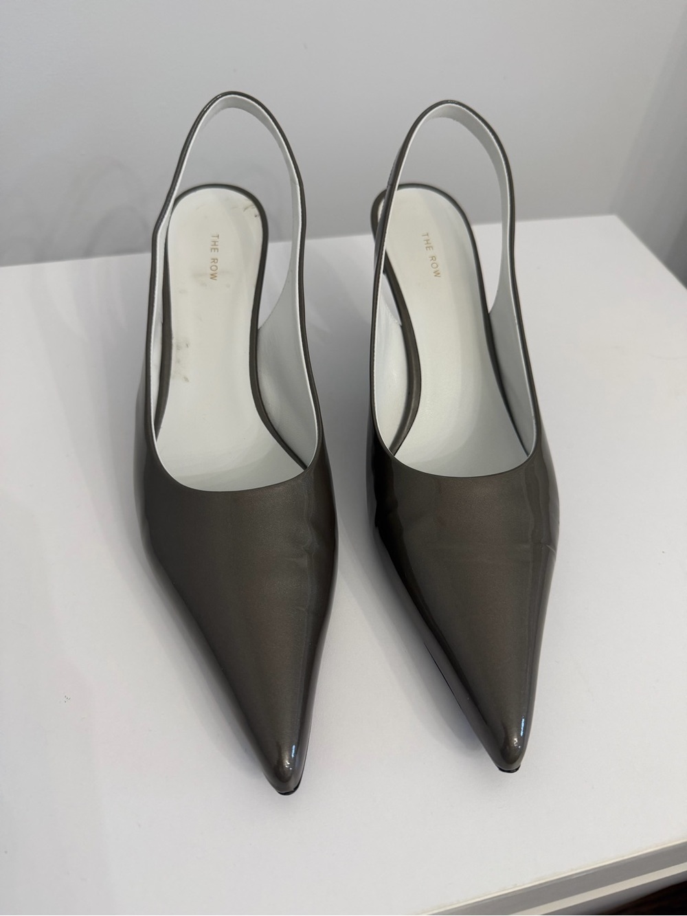 The Row Pointed Slingback Pump in Gray Patent